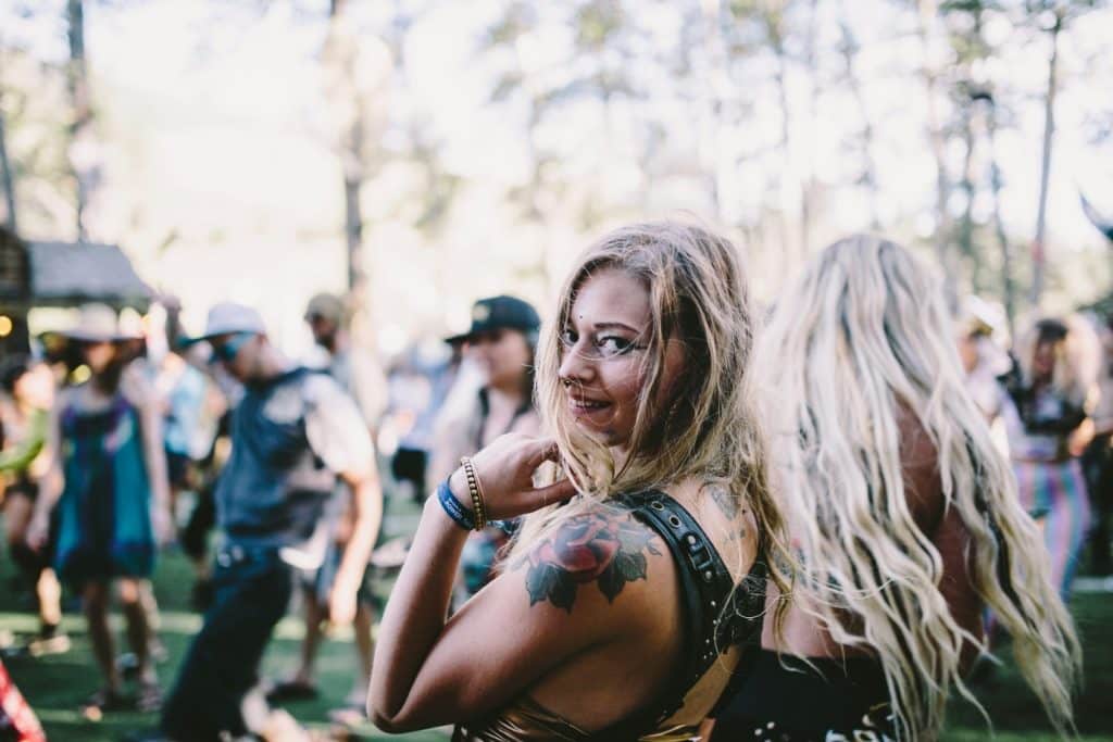 woman smiling facing sideway